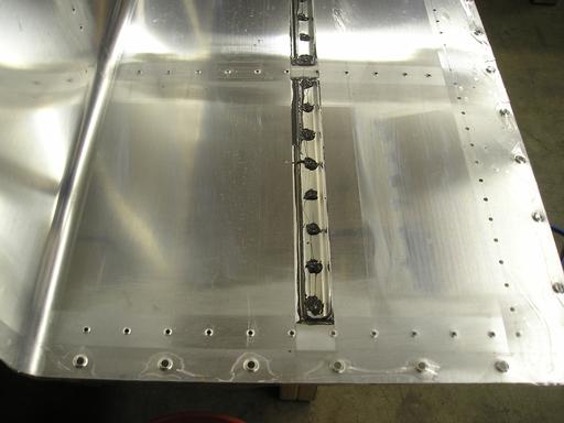 Stiffeners riveted into place