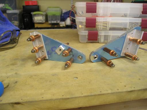 Putting together aileron hinge brackets