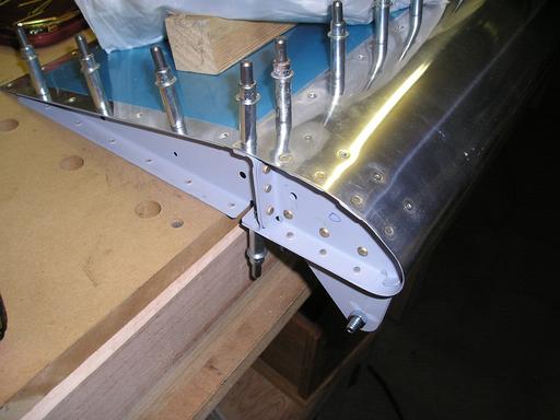 Rivet nose ribs to skins