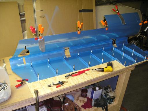 After shaping and smoothing the stiffeners, cleco'd them