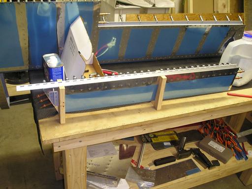 Bonding ribs in trim tab