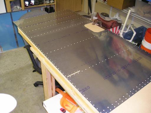 Dimpling outer lower skin