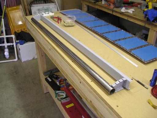 Riveted counterbalance to ribs