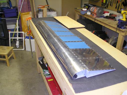 Rivet skins to ribs