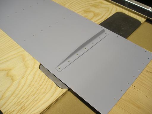 Backriveting skin and stiffener