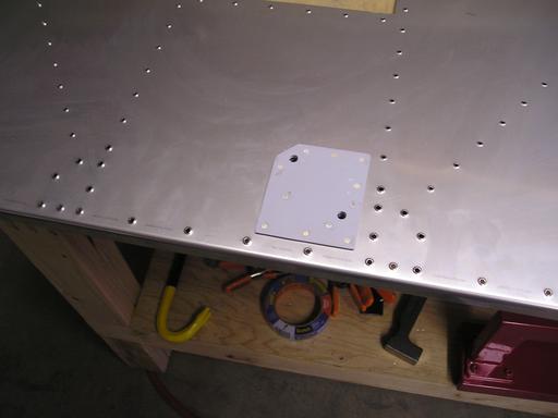 Riveting aux fuel pump doubler