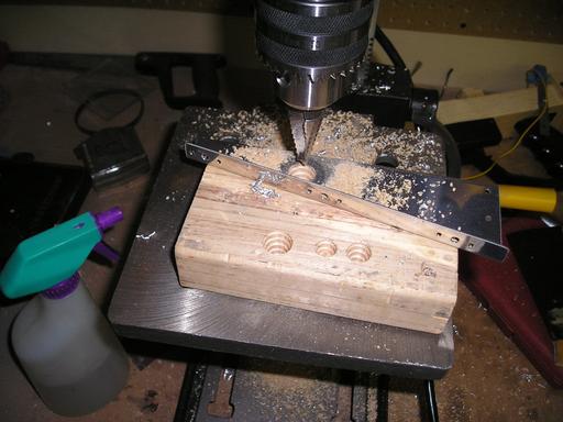 Drilling grommet holes in F-982B brackets