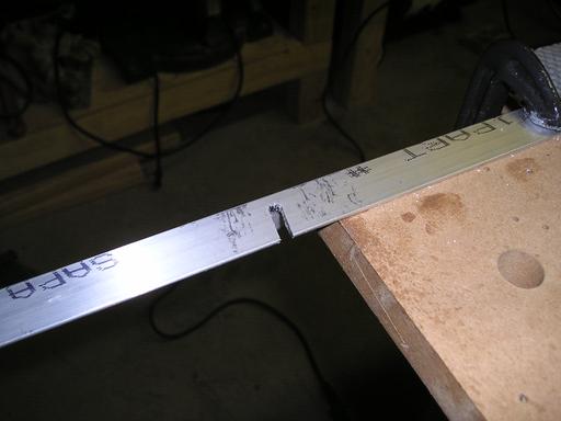 Cutting slot in longeron