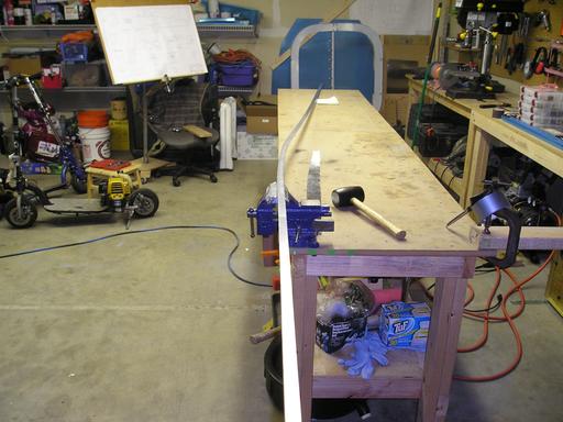 Setup for bending longeron