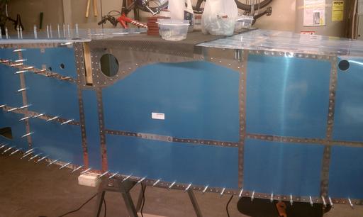 Riveting side skins