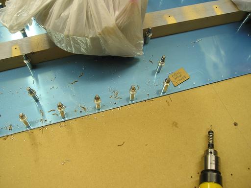 Drilling trailing edge holes