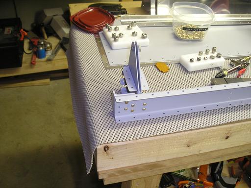 Inside nose rib assembly riveted to spar