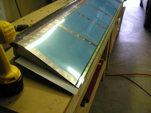 Installing rivets in trailing edge