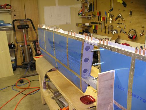 Clecoing rear spar into position