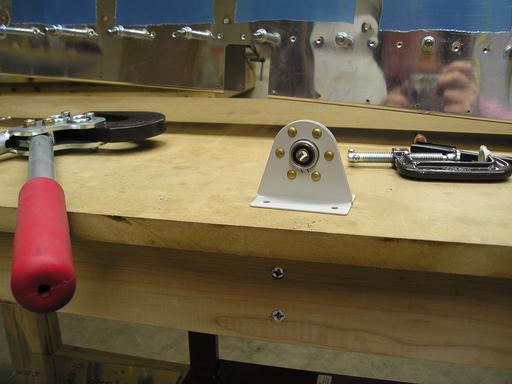 Riveted center bearing assembly