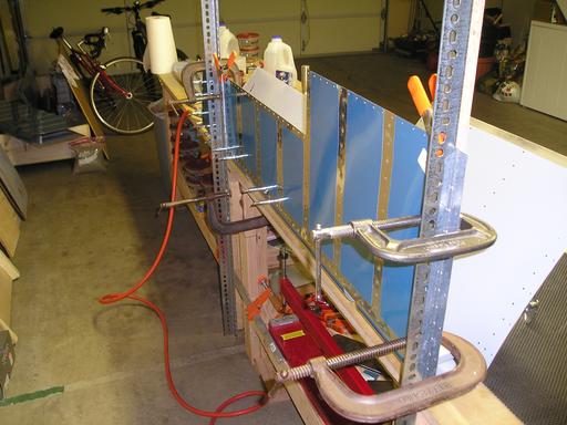 Setup for riveting top of spar to skin