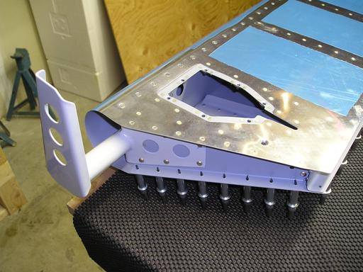 Riveting inside rib to skin