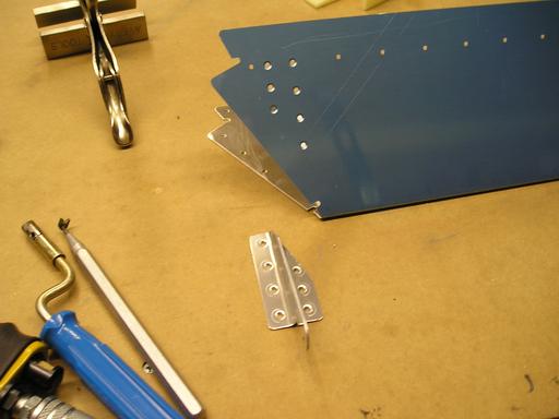 Match drilling, dimpling trim tab horns
