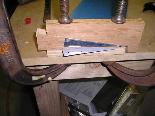 Bending ends of trim tab skin