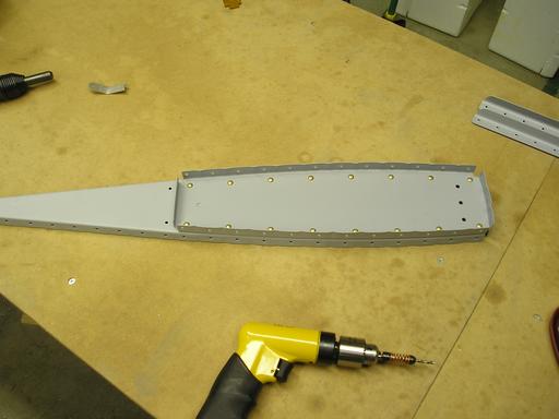 Riveted counterbalance ribs together