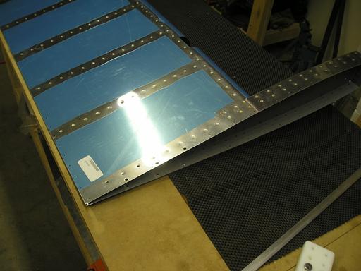 Counterbalance skin and rib riveting