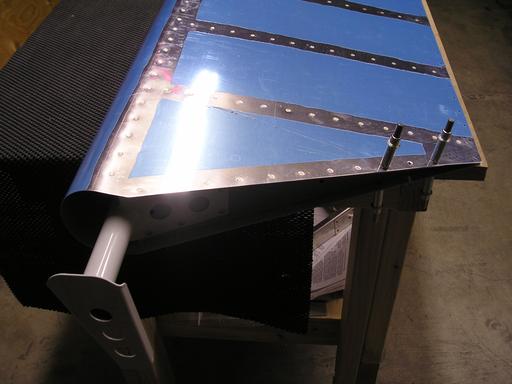 Riveting inner rib to skin