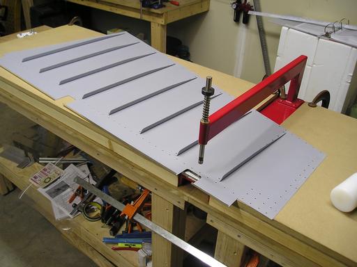 Dimpling rudder skins