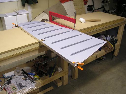 Angle clamped to skin to help hold it