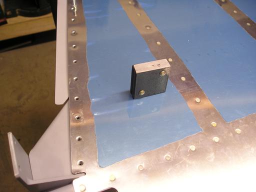 Bucking bar for rivets inside rudder horn brace
