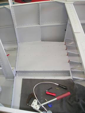 Left baggage floor