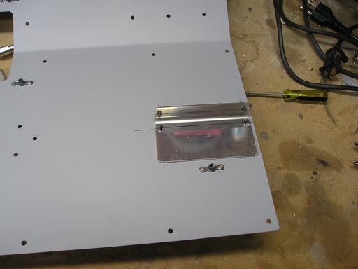 Aileron trim bracket