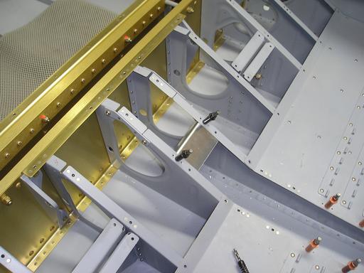 Installed bracket between ribs
