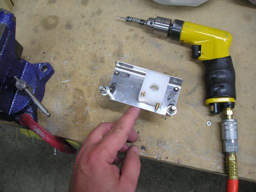 Nutplates in trim bracket