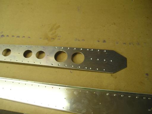 Countersunk holes on rear vertical spar doubler