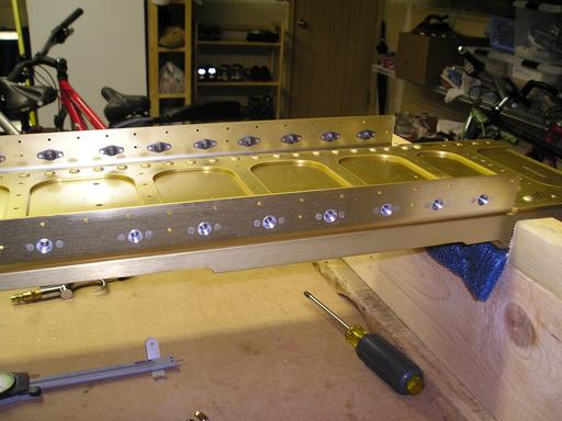 Countersinking the tank holes in spar