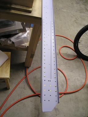 Rivets installed in spar