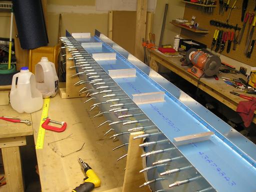 Attach angles fitted to tank assembly