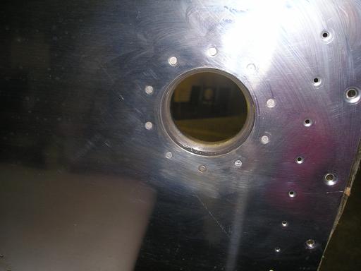 Fill fitting riveted