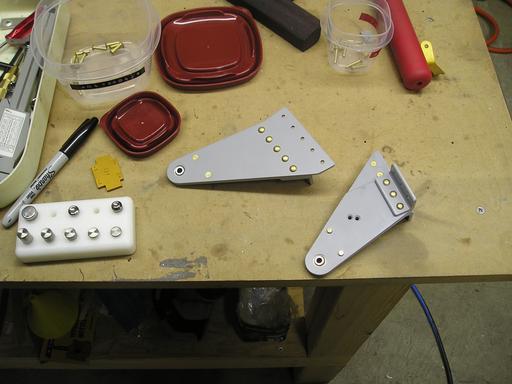 Hinges riveted together