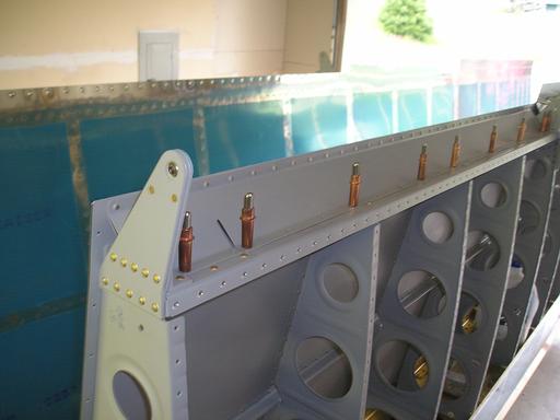 Left flap gap fairing riveting