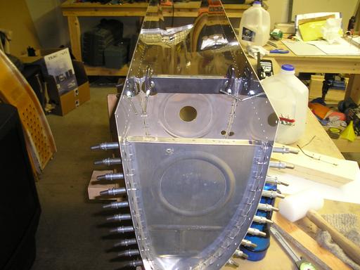 Installing tank ribs into skin