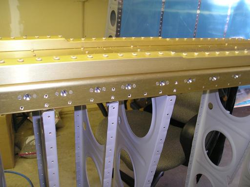 Countersinking rivet holes in spar flange