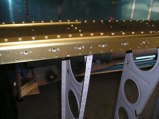 More rivet holes in spar