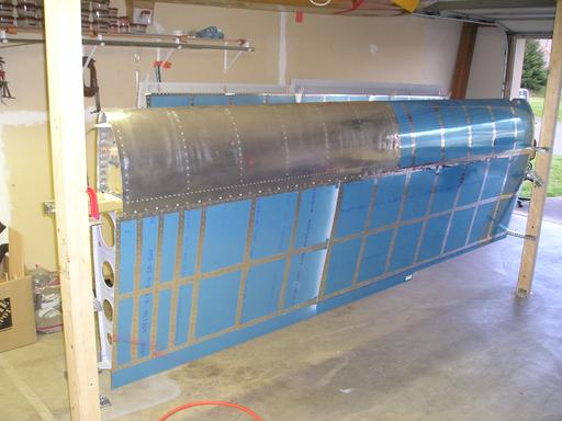 Upper wing skins riveted